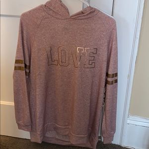 Mandee’s “love” rose gold sweatshirt